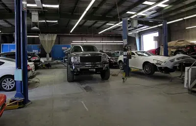 Above & Beyond Auto Body Paint and Towing
