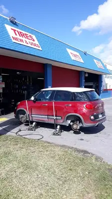 THE TIRE HOUSE