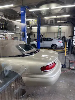 T J's Auto Center Inc