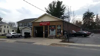 John's Auto Center, LLC