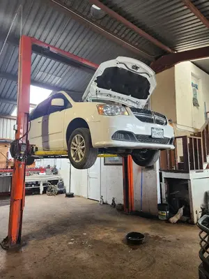 E.M AND SONS AUTO REPAIR AND BODY COLLISION