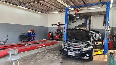 E & D INTERNATIONAL AUTO REPAIR ALIGNMENT & 24/7 TOWING SERVICE
